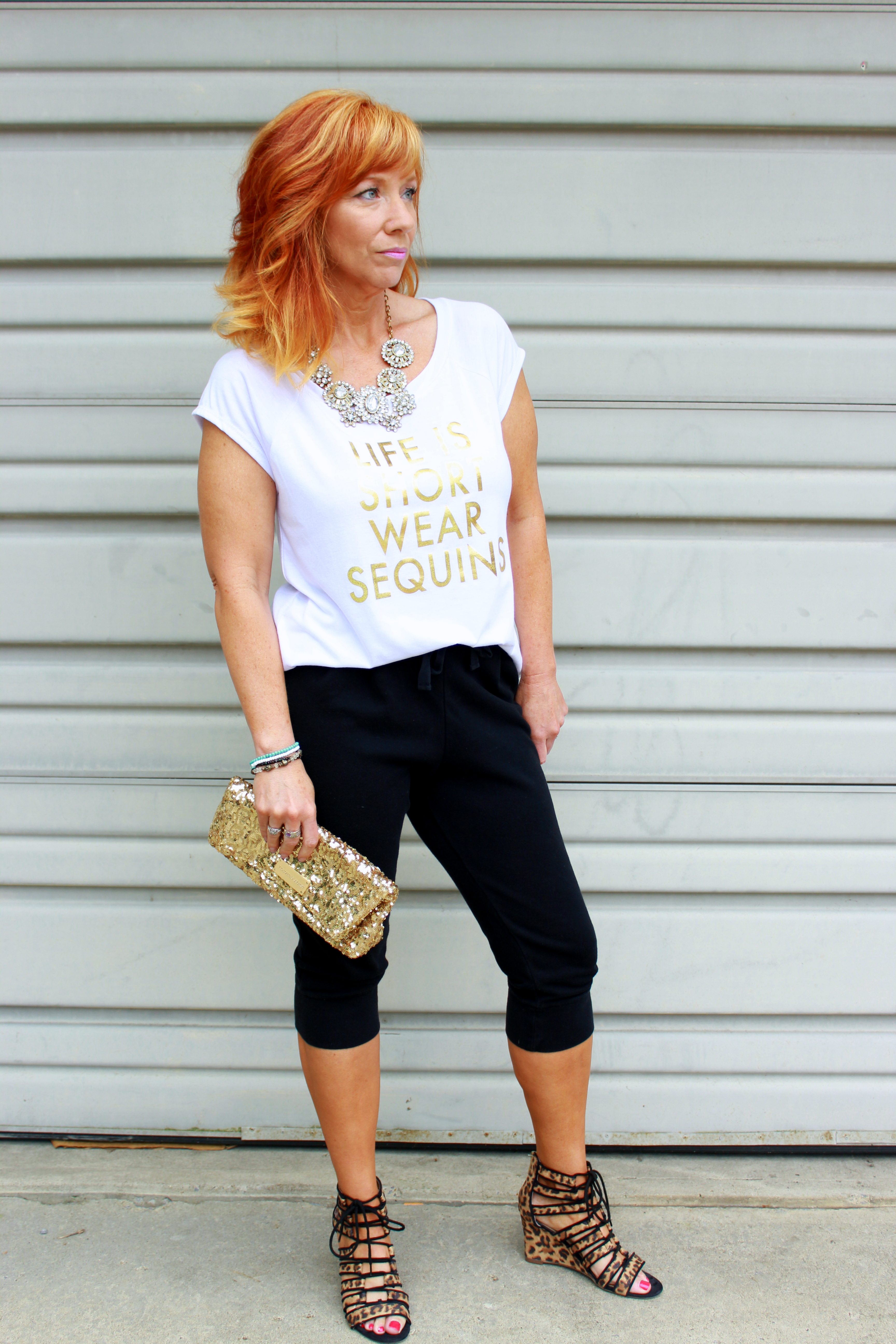 sequin clutch, cropped joggers, leopard wedges