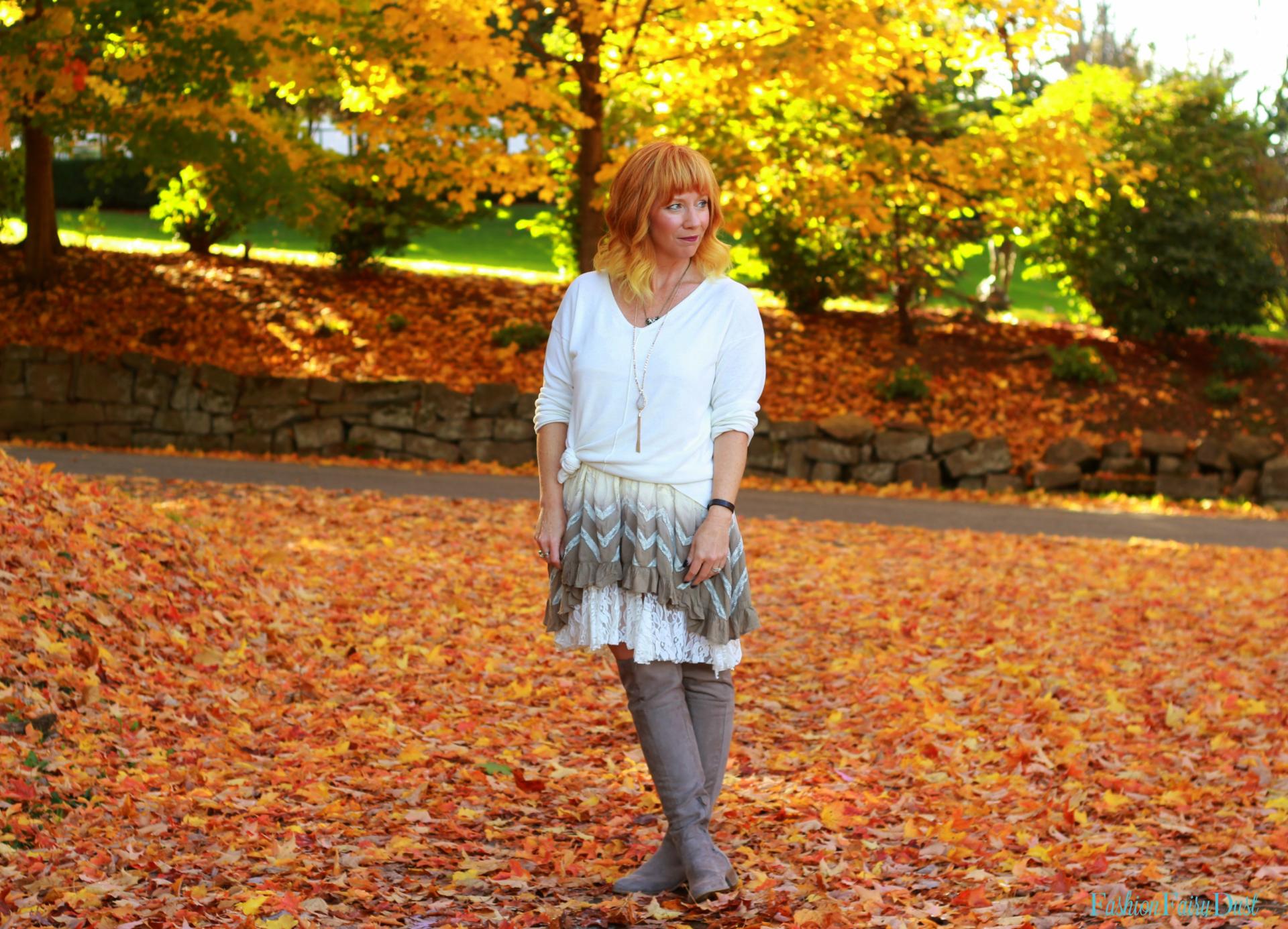 Boho tunic, over the knee boots and knotted sweater. Fall outfit inspiration.