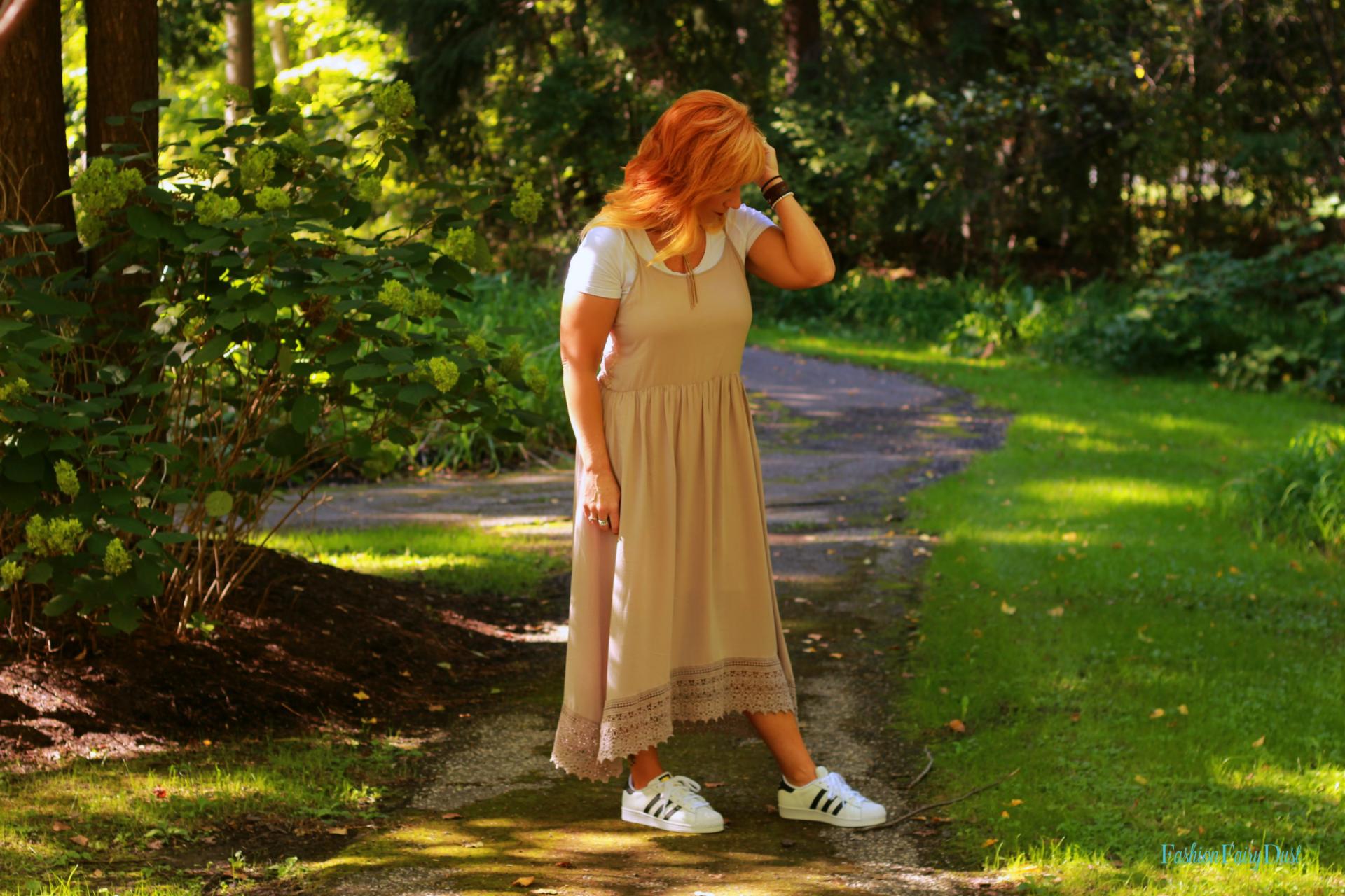 Taupe slip dress, white tee and Adidas. Slip dress layered over a tee.