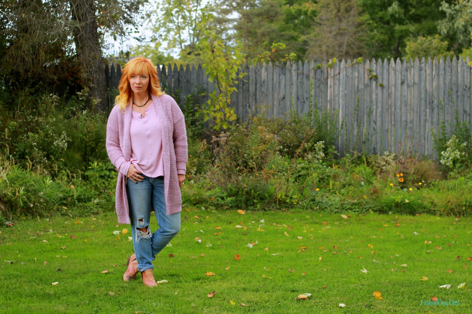 Pink shawl collar cardigan, boyfriend jeans and floral ankle boots. Pastels in the Fall.