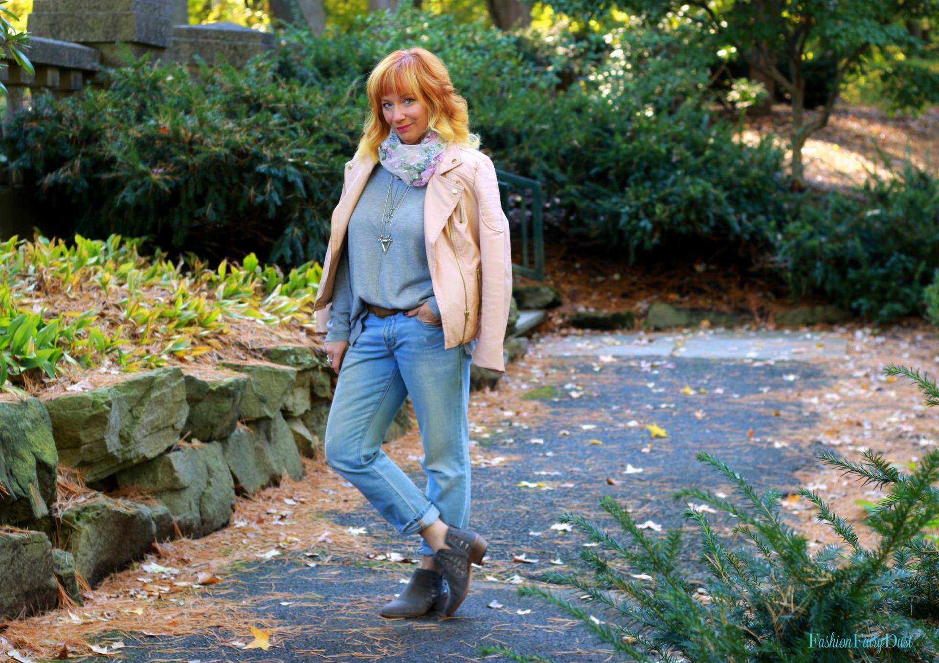 Pink moto jacket, gray ankle boots and boyfriend jeans. Dressing comfortably while still looking stylish.