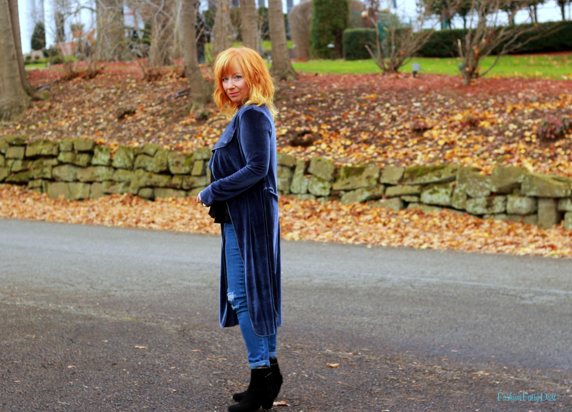 Blue velvet duster, distressed skinny jeans and ankle boots. How to style a casual holiday look.