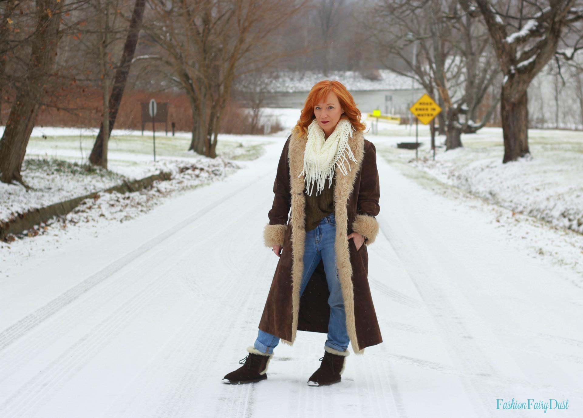 Lace up sweater, long suede coat and Bearpaw boots.