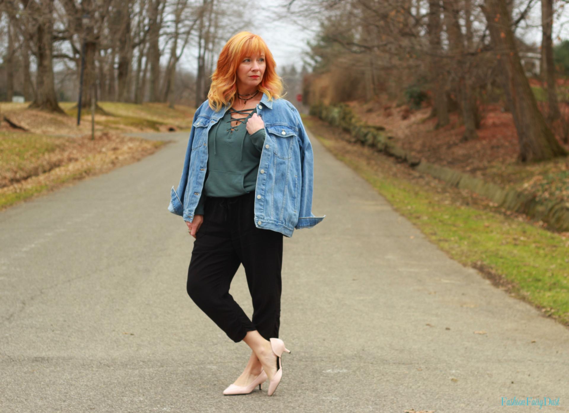 Teal lace up hoodie, black slouchy pants and denim jacket. How to do dressy casual.