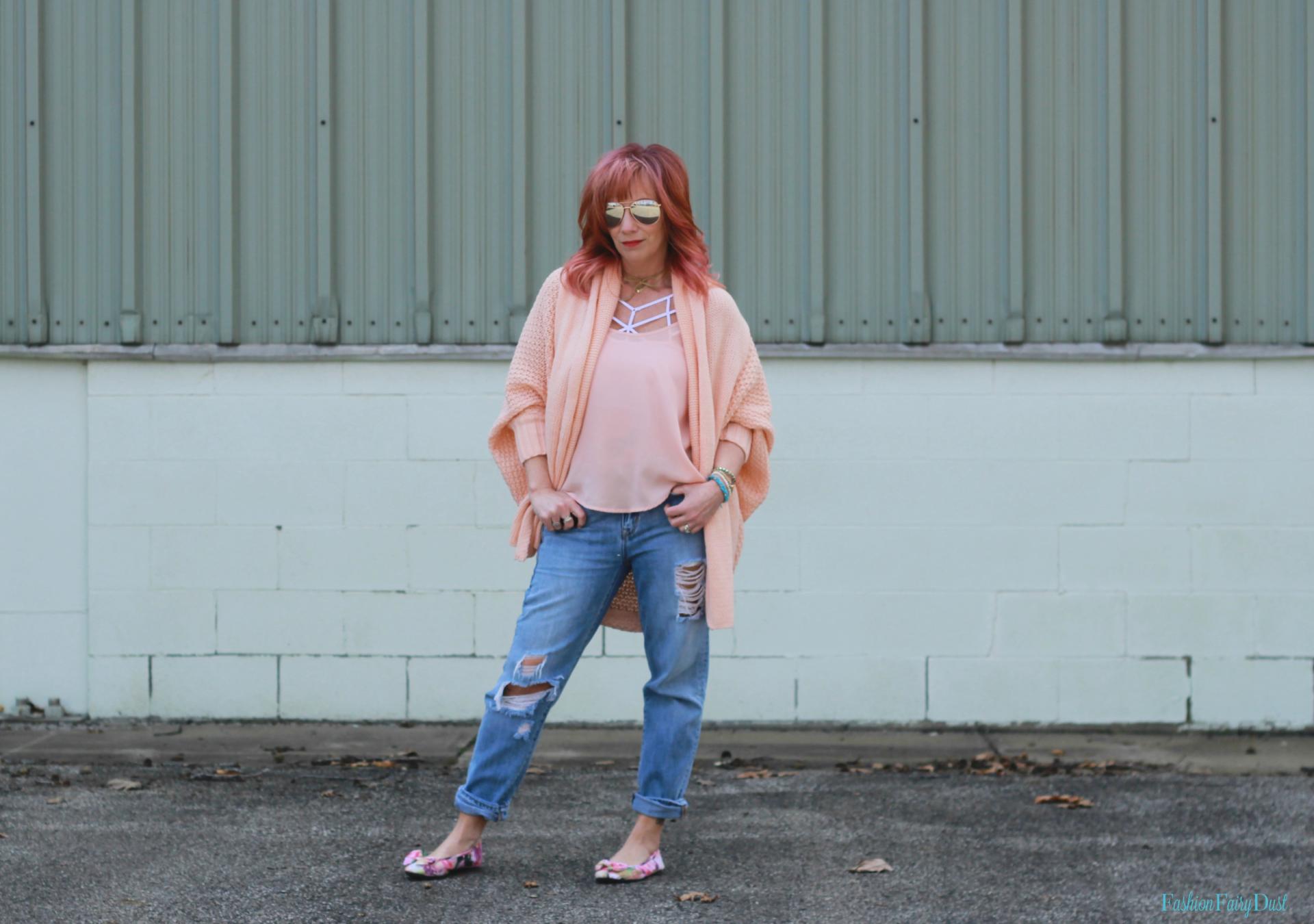 Peach cocoon cardigan, floral print flats and distressed jeans. How to toughen up pastels.