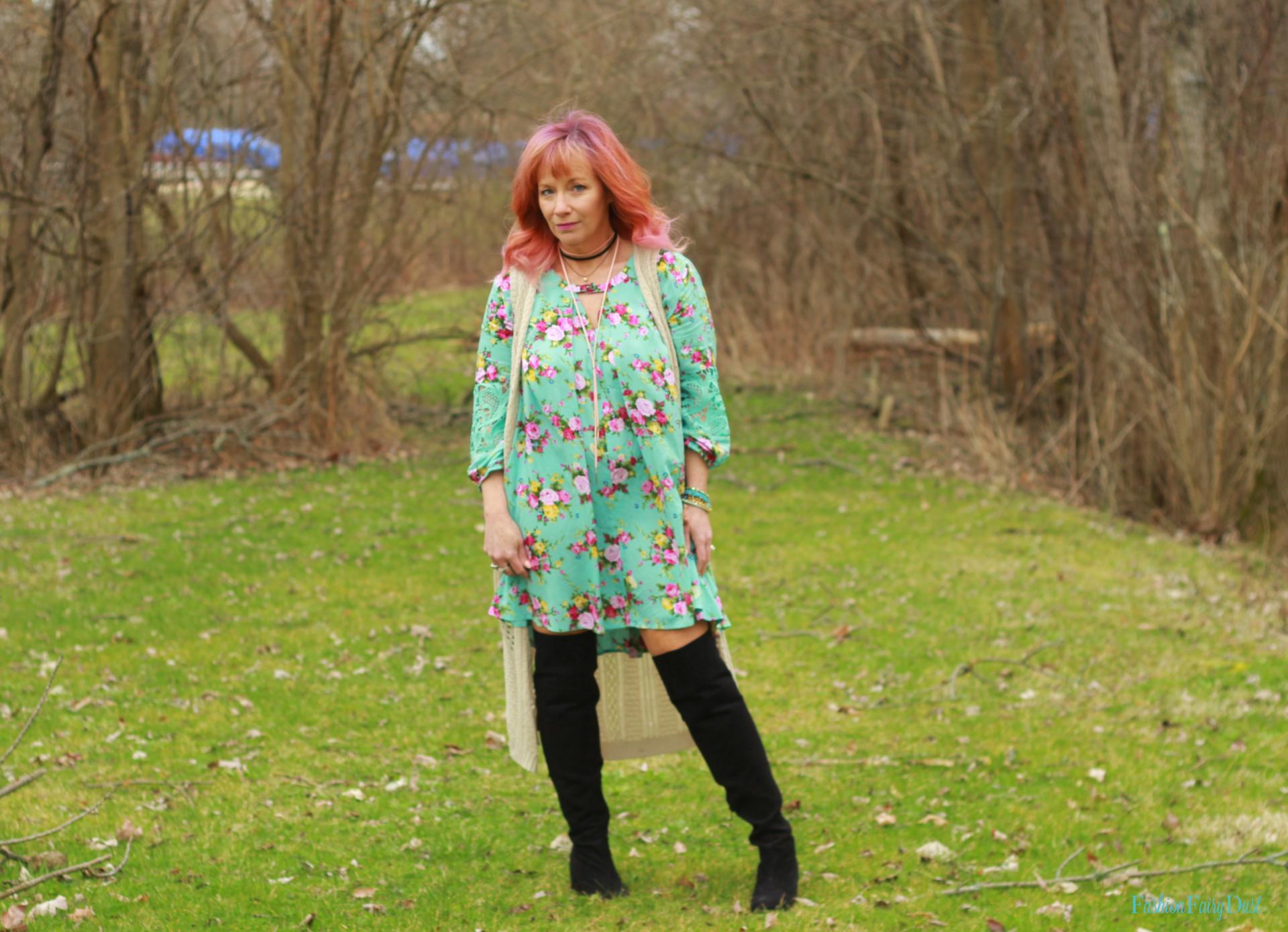 Turquoise floral tunic, long vest and over the knee boots. Styling a warm weather dress for cooler weather.