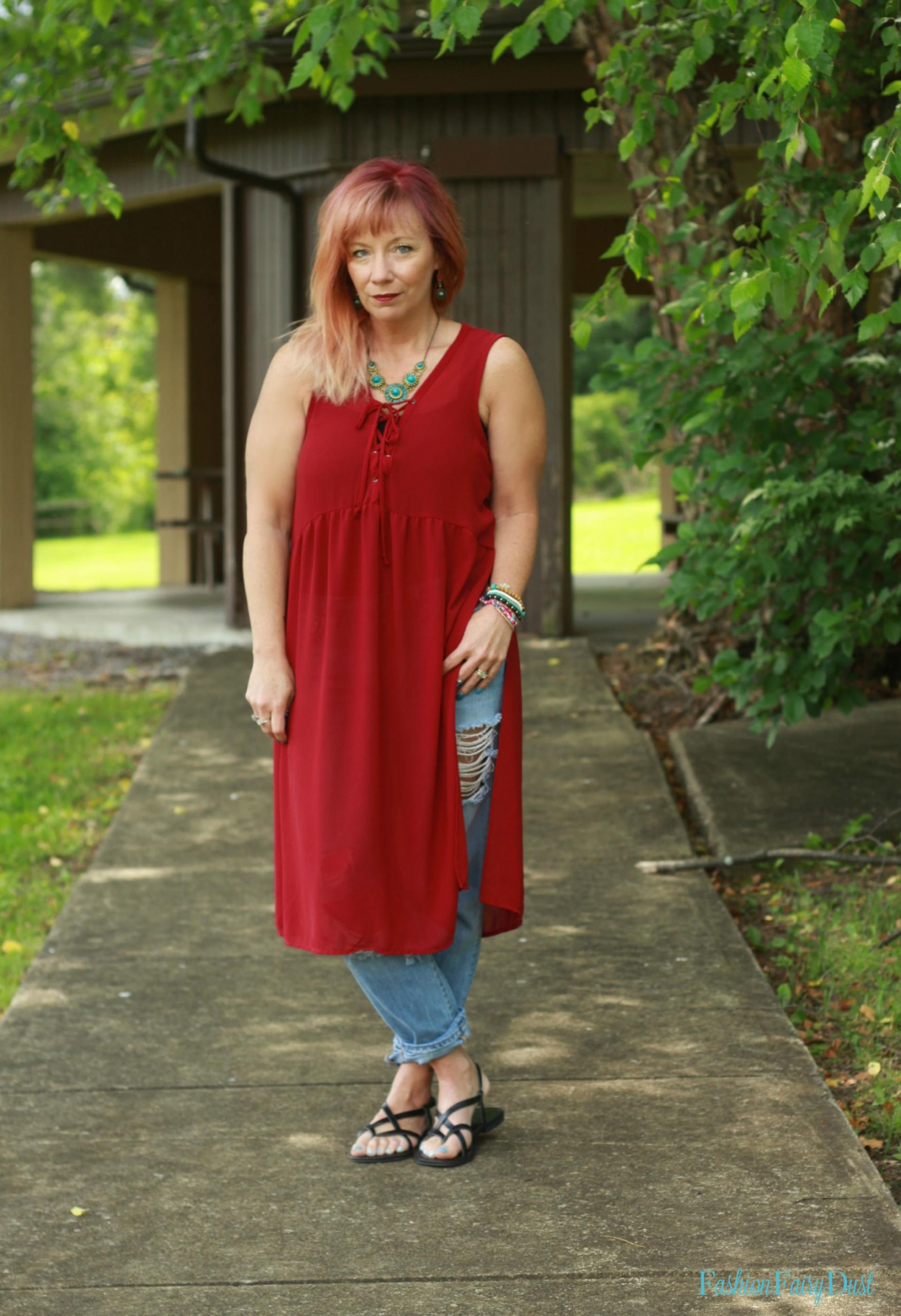 Tunic tank top, boyfriend jeans and embroidered bag.