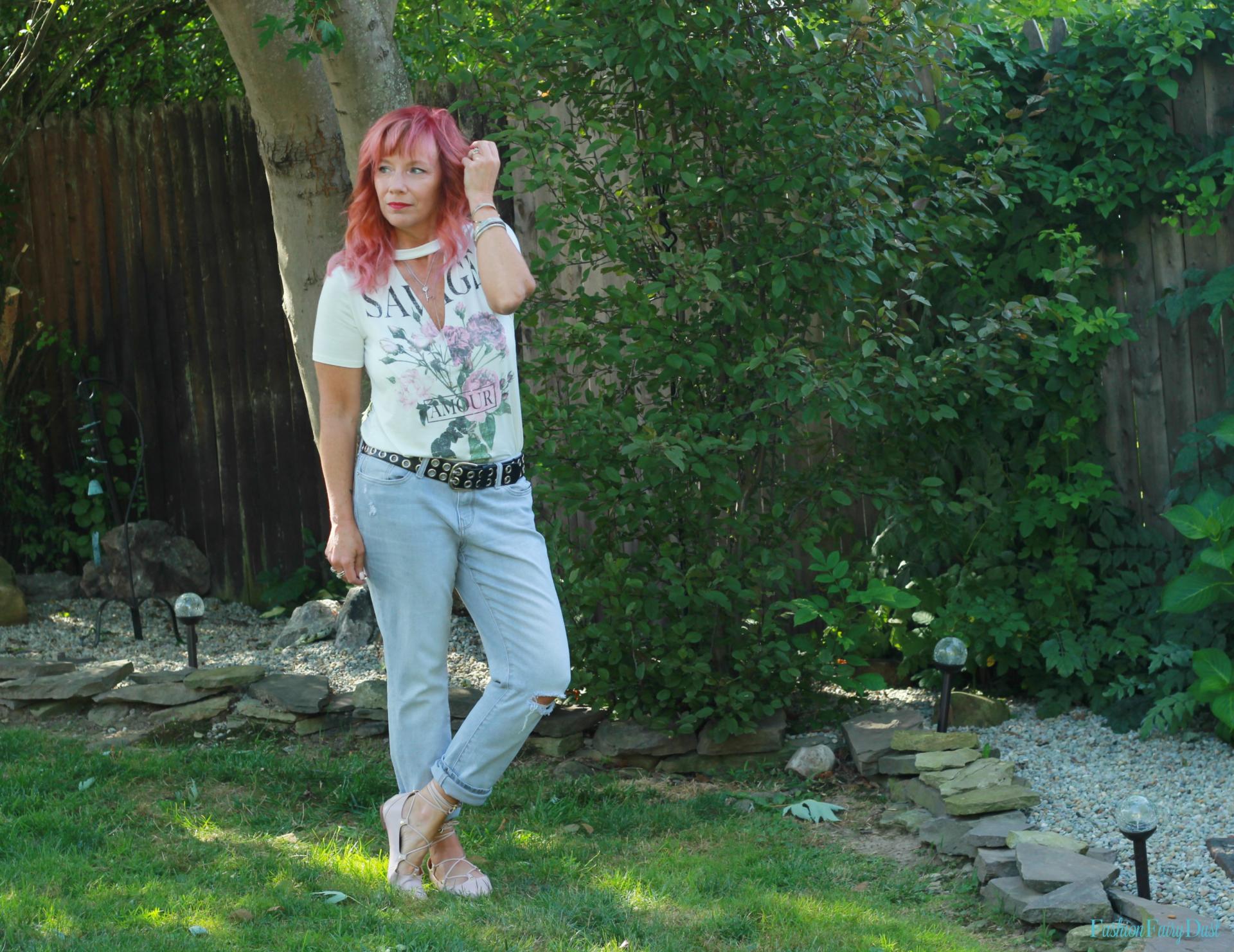 Graphic tee, gray boyfriend jeans and lace up flats.