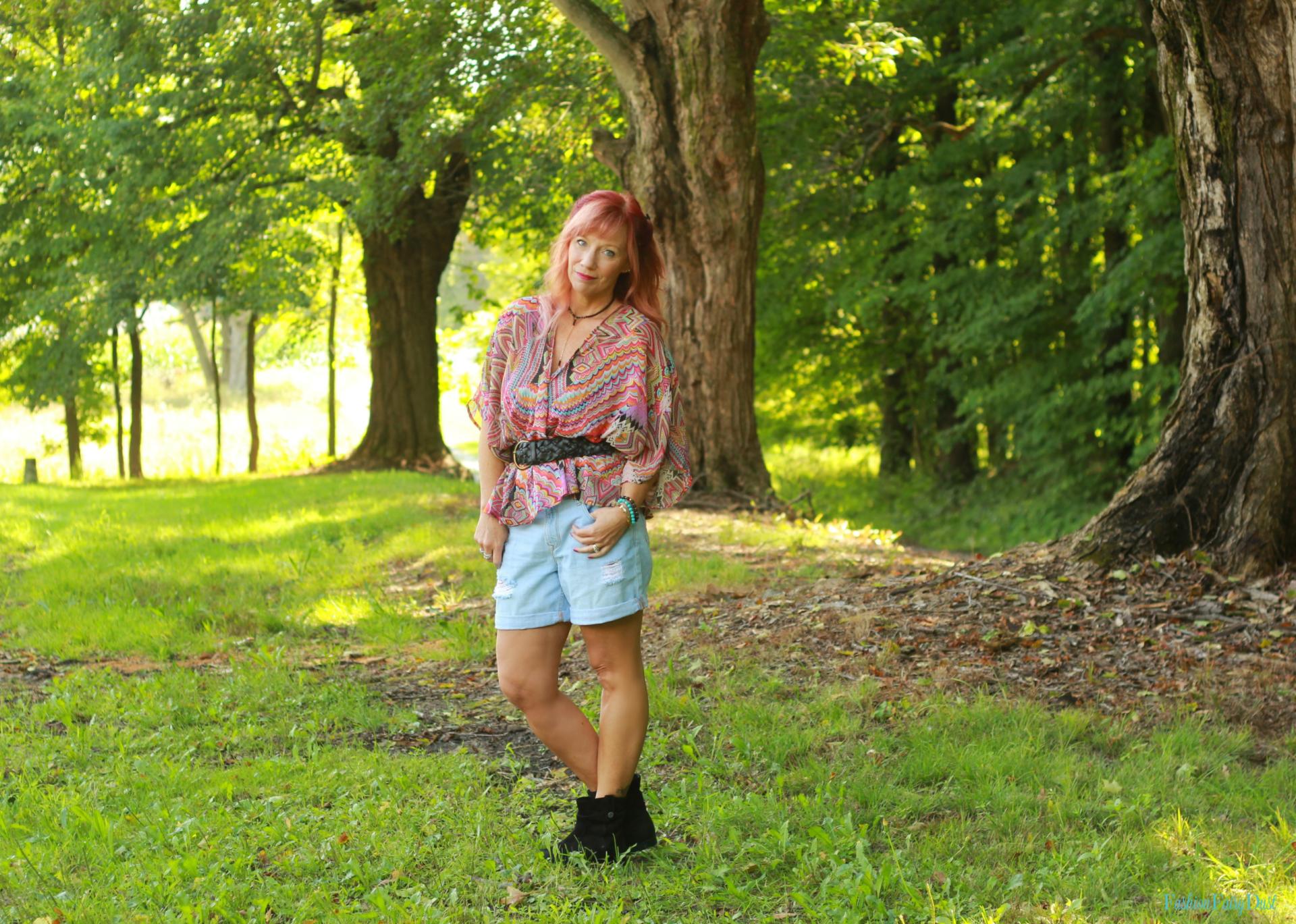 Kimono as a top, black ankle boots and denim shorts.