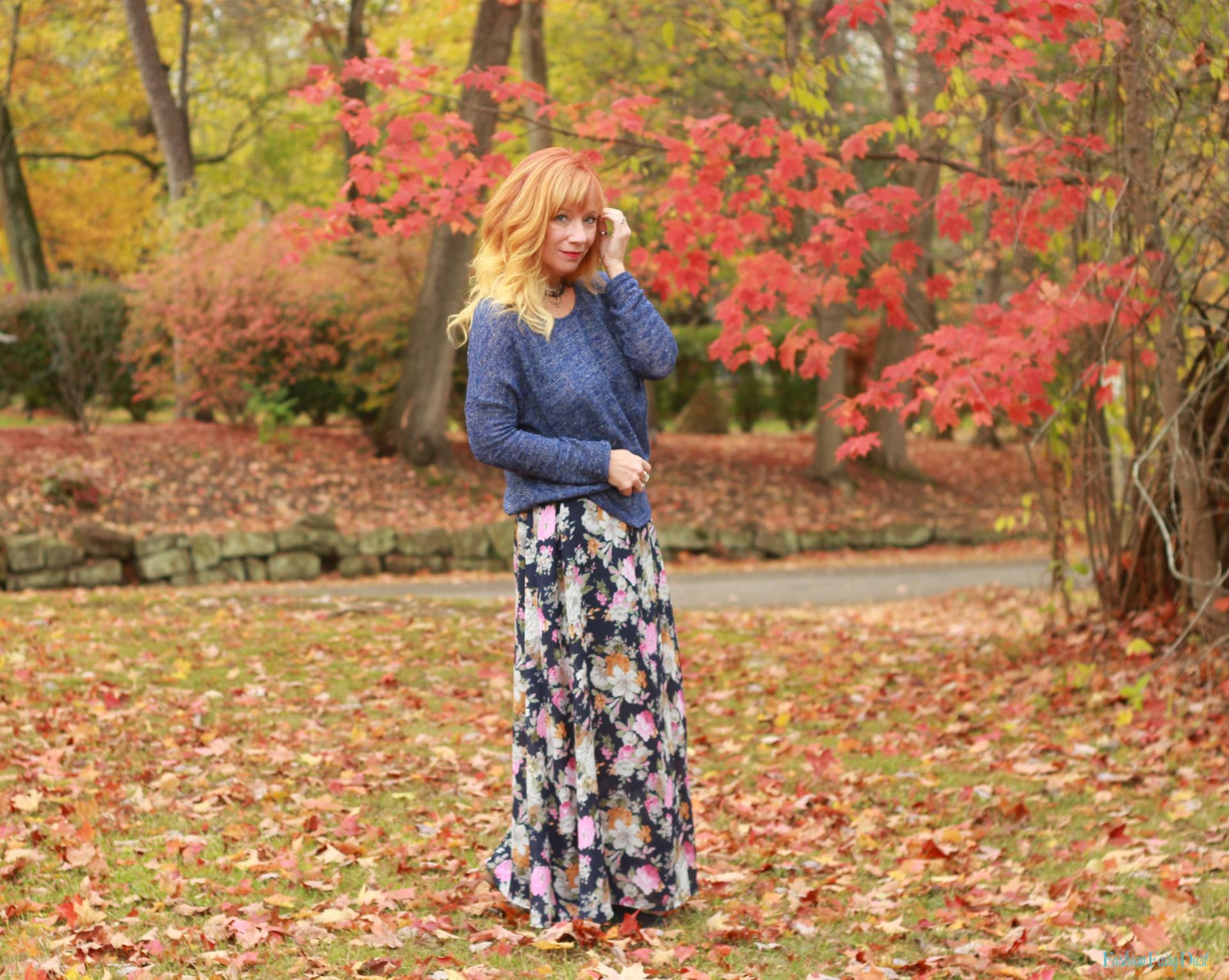 Floral print maxi dress, blue sweater, blue suede boots.