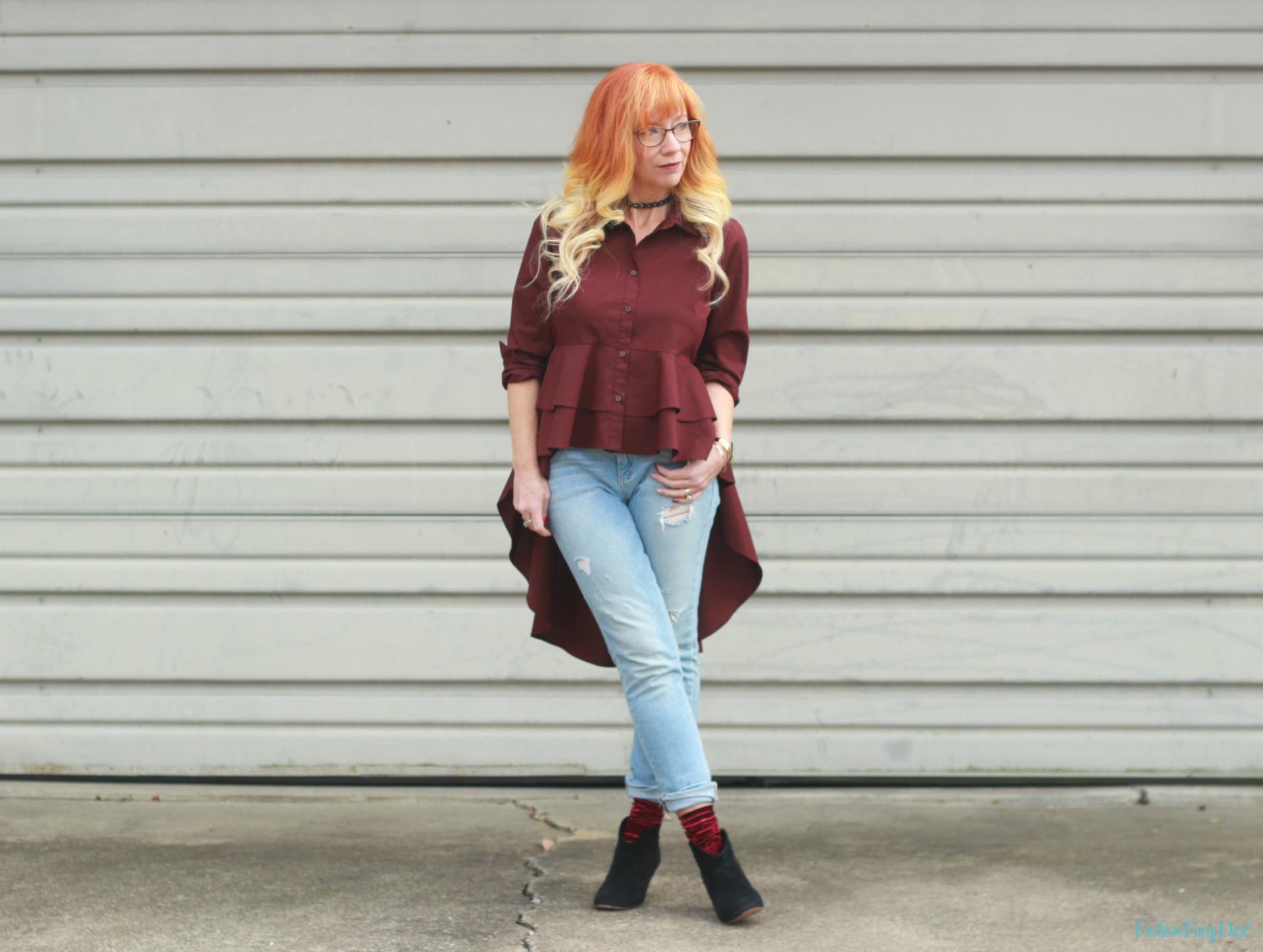 High low ruffle hem shirt, skinny jeans and velvet socks.