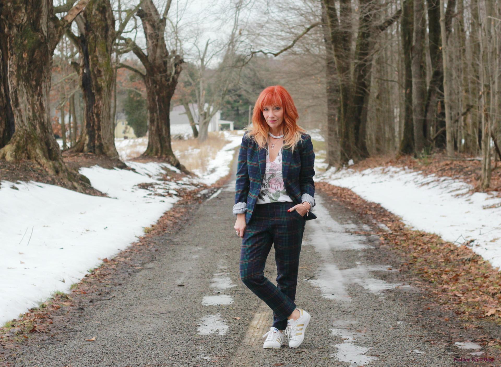 Plaid suit, sneakers and choker tee shirt.