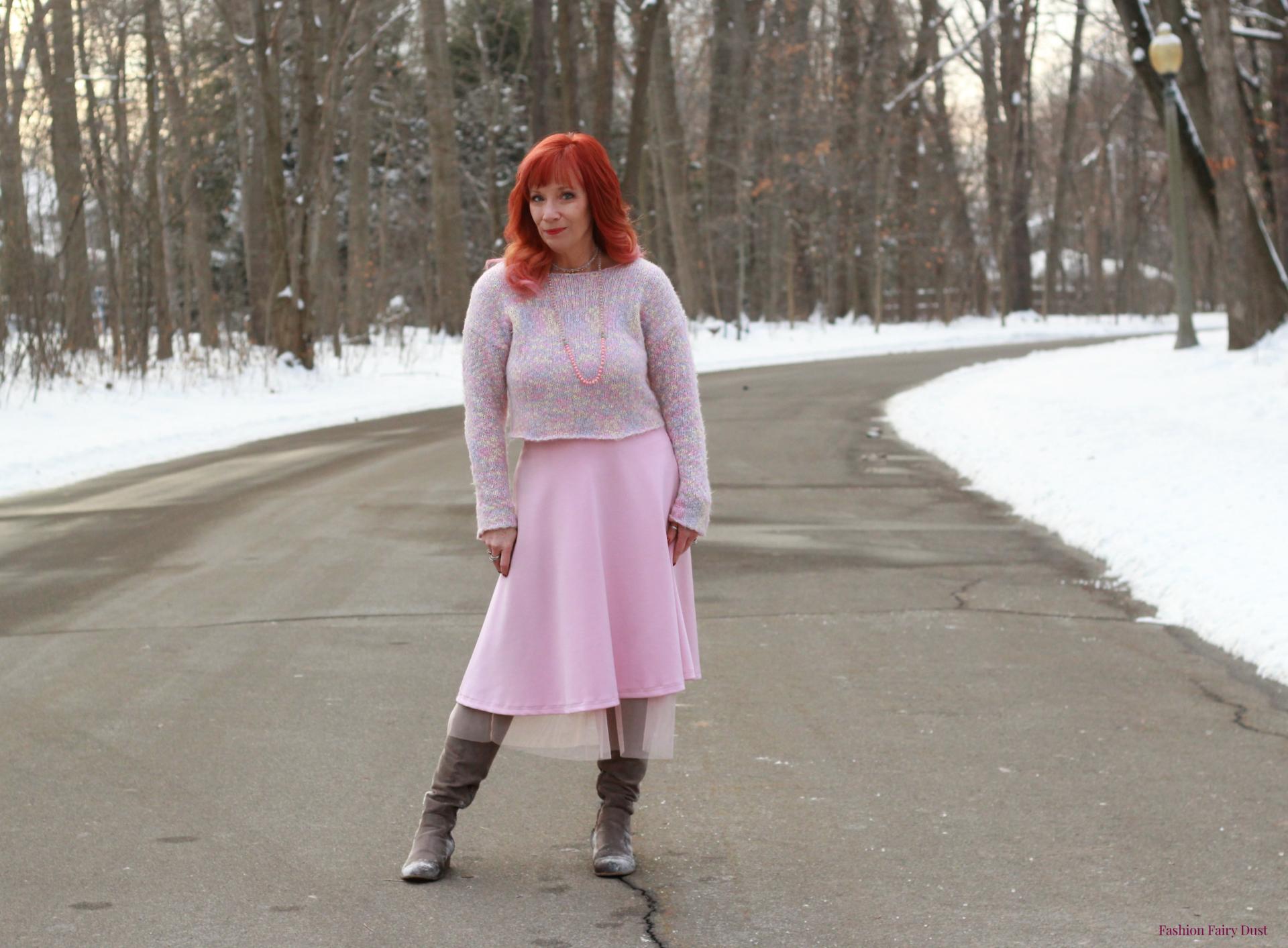 Mixed pastel sweater, pink skirt and over the knee boots.