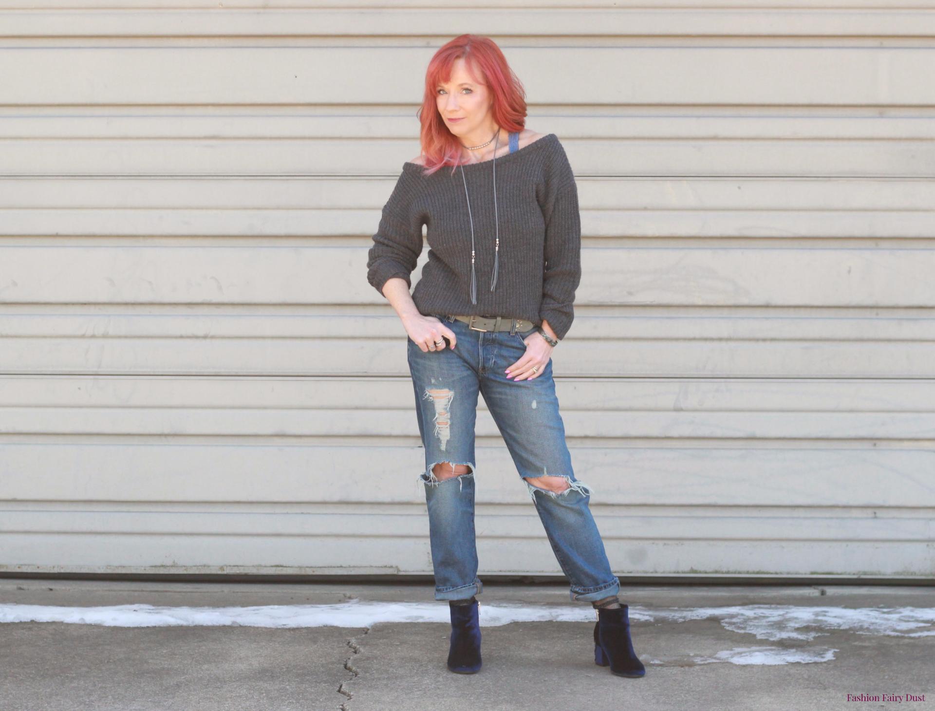 Blue velvet boots, off the shoulder sweater and boyfriend jeans.