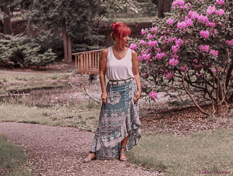 Wrap maxi skirt, tank top, and ankle tie sandals.