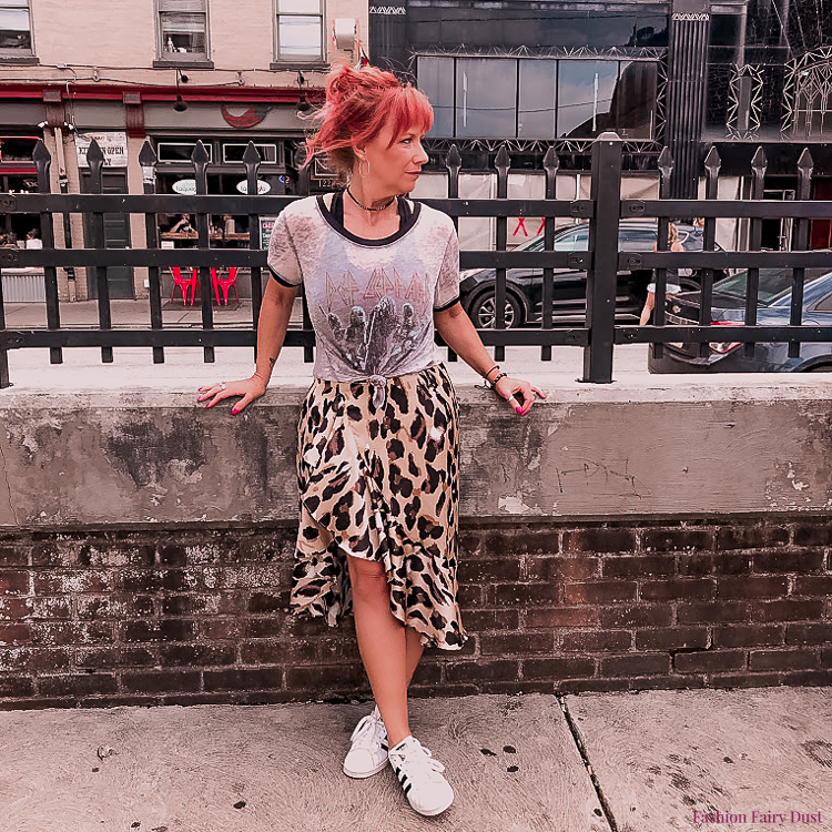 Leopard print skirt, Adidas and graphic tee.