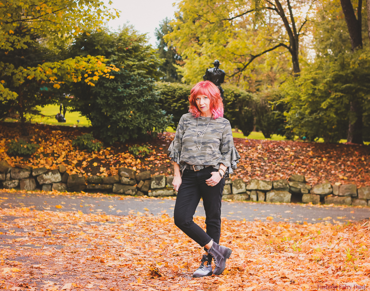 Camo sweatshirt & velvet combat boots.