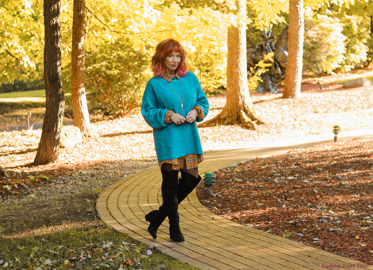 Plaid tunic shirt, sweater and over the knee boots.