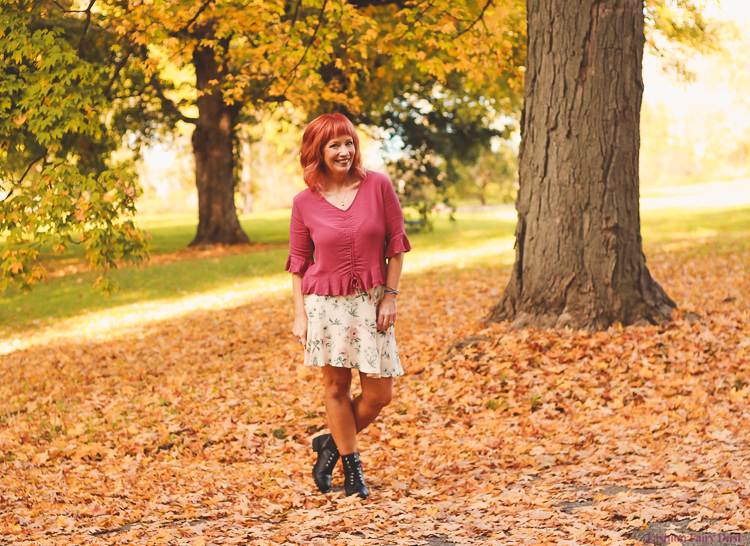 Floral mini skirt, ruched top and combat boots.