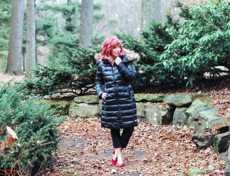 Down coat, plaid flannel shirt and red pumps.
